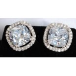 A pair of white metal silver 925 and cz stud earrings.