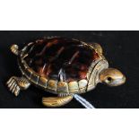 A 19th Century silver plated brass and tortoise shell vesta case modelled as a turtle with hinged