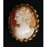 A 1950's vintage Italian hand carved cameo and rolled 9ct gold brooch..