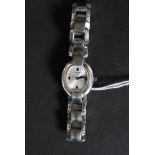 A contemporary ladies stainless steel Tissot wristwatch with sunburst face,
