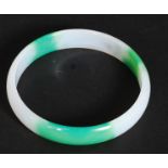 A 20th century Chinese oriental green and white jade bangle bracelet

FREE UK POSTAGE ON ALL LOTS