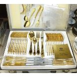 An SBS Bestecke, Solingen Modell 25 gold-plated twelve-setting canteen of cutlery in case.