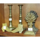 A pair of 19th century brass telescopic candlesticks on circular bases, 23.5cm extended, a pair of