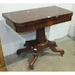 A 19th century mahogany fold-over tea table on turned column and quadruped base, 91.5cm wide.