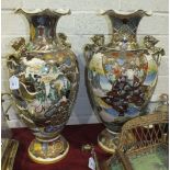 A pair of large 20th century Satsuma baluster vases decorated with geisha and other figures, with