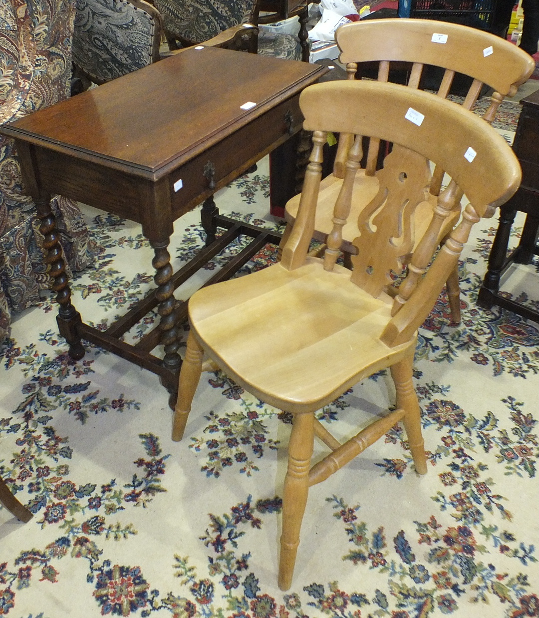 An oak single-drawer hall table on barley-twist supports united by stretchers, 75cm wide, two