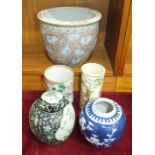 An 18th century Chinese Mandarin tankard, 12cm high, a Chinese jardinière and three other pieces, (