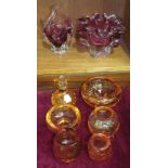 A Whitefriars amber glass enclosed-bubble-decorated candlestick, 10cm high, three similar small