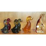 A Whitefriars amber glass enclosed-bubble-decorated duck, 17cm high, five similar smaller