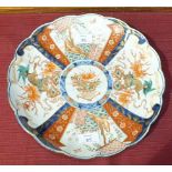 An 'Imari' fluted plate of typical decoration, 30cm diameter.