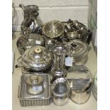 A 19th century plated oval tea caddy and cover, 7cm high, a cake basket, a set of four salts and