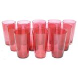 A set of twelve cranberry tumblers, 9.5cm high, one smaller tumbler, a cranberry glass bowl, 12cm