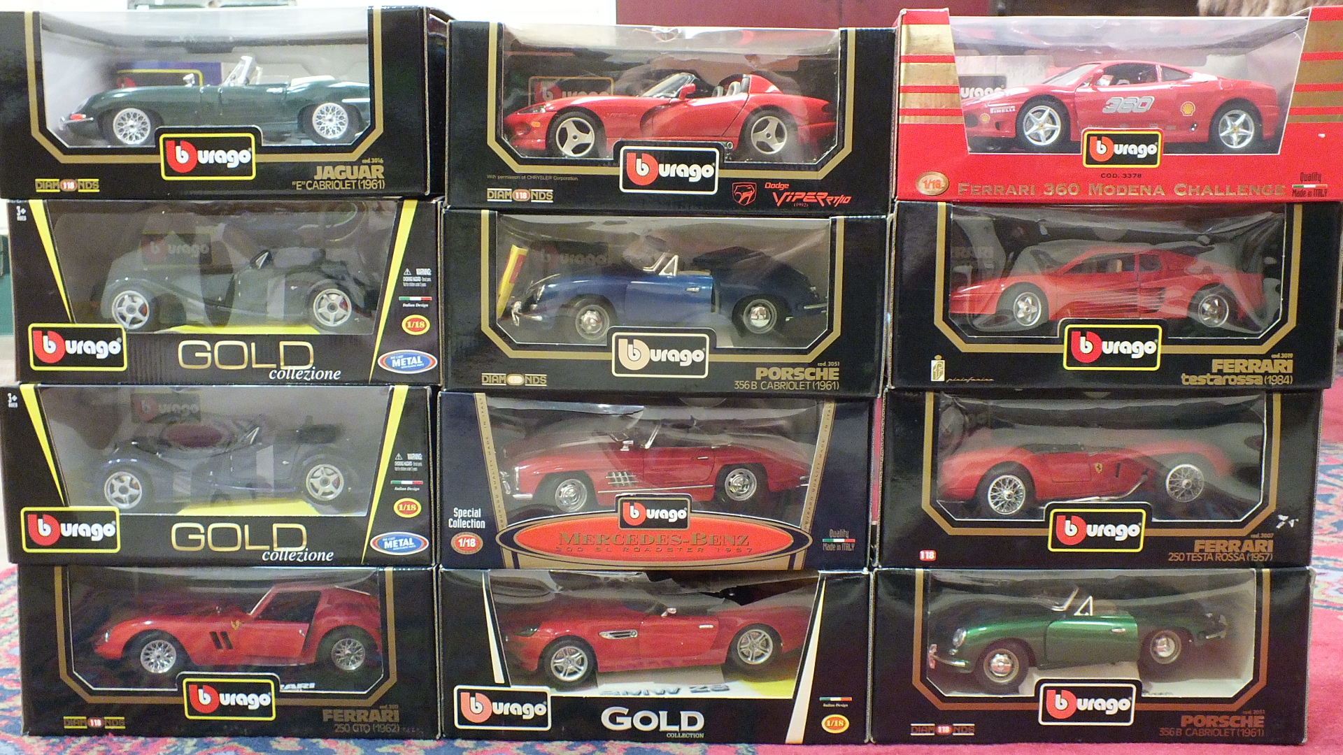 Twelve boxed Burago 1-18 scale models of sports cars, (12).