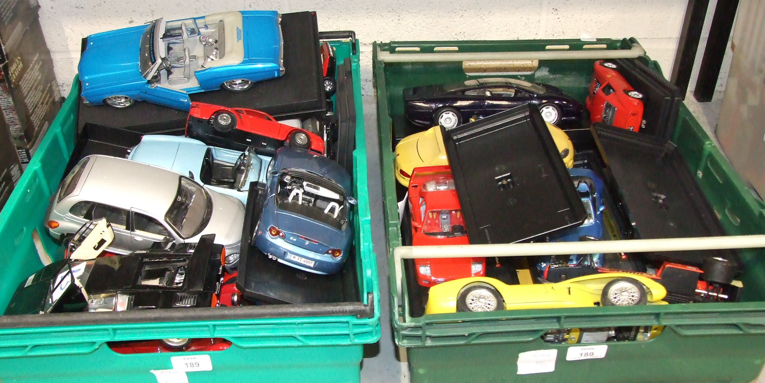 Thirty-eight unboxed diecast scale models by Burago, Maisto etc, (38).