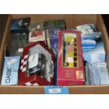 A quantity of boxed diecast vehicles, mainly foreign makes, (approximately 35).