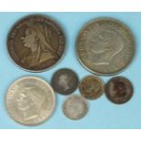 A Victoria 1893 crown, an 1843 half-farthing, a George VI 1937 crown, a 1942 florin and three