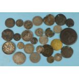 A collection of British and foreign coinage in varying conditions.