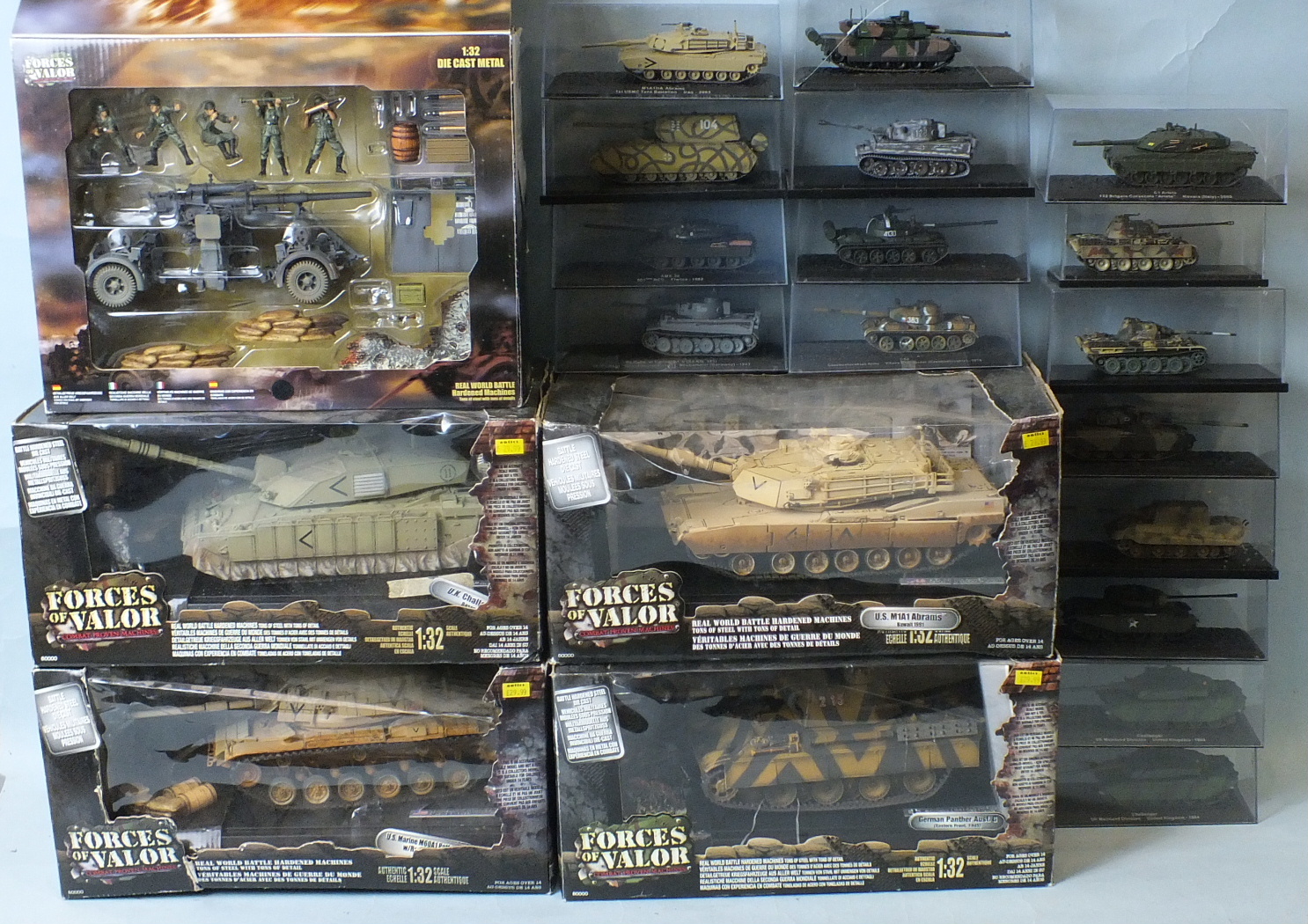 Unimax Toys, four boxed 'Forces of Valour' 1:32 scale models of tanks, one of a German Flak gun, all