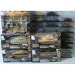 Unimax Toys, four boxed 'Forces of Valour' 1:32 scale models of tanks, one of a German Flak gun, all