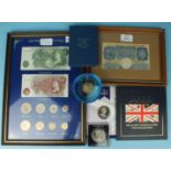 A Bank of England Peppiatt blue £1 note E05H 125210, framed and glazed, a framed set of Great