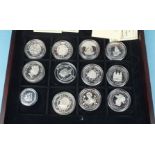 A collection of twelve Royal Mint Queen Elizabeth The Queen Mother silver world coins, five with