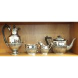 A four-piece matched plated half-gadrooned tea service.