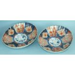 A pair of 19th century Japanese Imari scalloped bowls decorated in typical Imari colours, 22cm long,