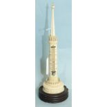 A Victorian ivory thermometer in the form of an architectural column, on turned wood base, 20cm