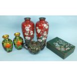 A pair of red cloisonné vases, a teapot and cover, a small pair of vases and a green cigarette