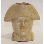 A Steven Green (Lambeth) small stoneware jug in the form of a bust of Napoleon wearing a cocked hat,