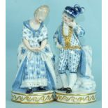 A pair of late-19th century Meissen figures of a lady and a gentleman, in blue and white with gilt