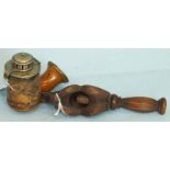 A 19th century carved wood nutcracker in the form of a squirrel, 18cm long, (a/f) and a carved