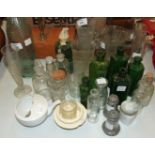 A collection of laboratory measuring glasses and other miscellaneous items.