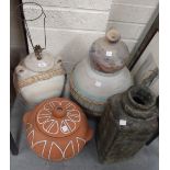 A collection of modern Eastern European pottery vases and other ceramics.