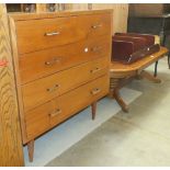 A 1970's teak rectangular chest of two short and three long drawers, on tapered legs, 92cm wide, a