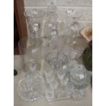 A collection of glassware, including decanters, vases, drinking glasses etc.