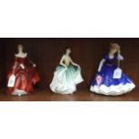 A collection of three Royal Doulton figurines, 'Fragrance' HN3311, 'Cynthia' HN2440 and 'Mary'