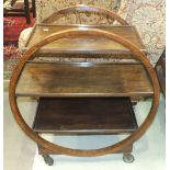 A stained wood three-tier tea trolley in the Art Deco style, 73cm wide, 80cm high.