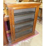 A Victorian walnut floor-standing single-door bookcase, 84cm wide, 107cm high, (glass lacking).