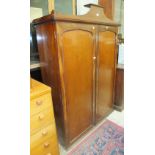 A 19th century mahogany two-door floor-standing cupboard, 174cm high, 122cm wide.