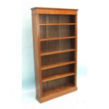 A Georgian-style mahogany open bookcase of unusually narrow proportions, 92cm wide, 169cm high.