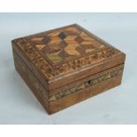 A Japanese rosewood and ivory games counter, each ivory tab inlaid with a mother of pearl and semi-