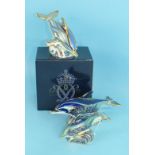 A collection of three Crown Derby Limited Edition animal paperweights, 'Lyme Bay Baby Dolphin 2003',