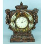 A late-Victorian Watcombe South Devon glazed terracotta mantel clock in the form of a lidded flask