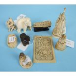 A group of various ivory carvings, including elephant, figures, Buddha, boat etc.