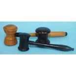 A turned boxwood and ebonised gavel, another smaller ebony gavel and gavel head, (3).