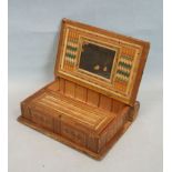 A 19th century straw work box in the form of a book, hinged to reveal compartments within, 19 x 15 x