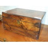 A Victorian ladies walnut travelling box, with hinged lid, dressing case fitment lacking, over