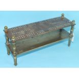 A bronze and brass cribbage board, the two rectangular tiers on turned legs, 28cm long, 13cm high,