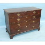 A Georgian mahogany rectangular chest of two short and three long cock-beaded drawers on bracket